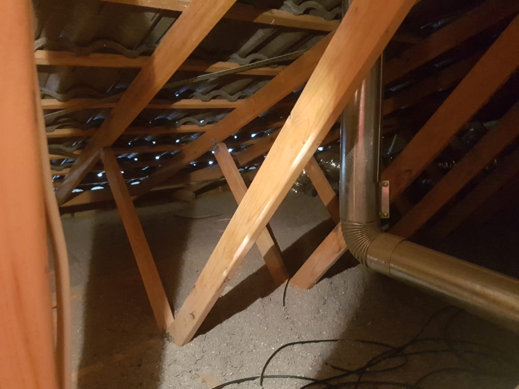 Before Cleaning Roof Insulation