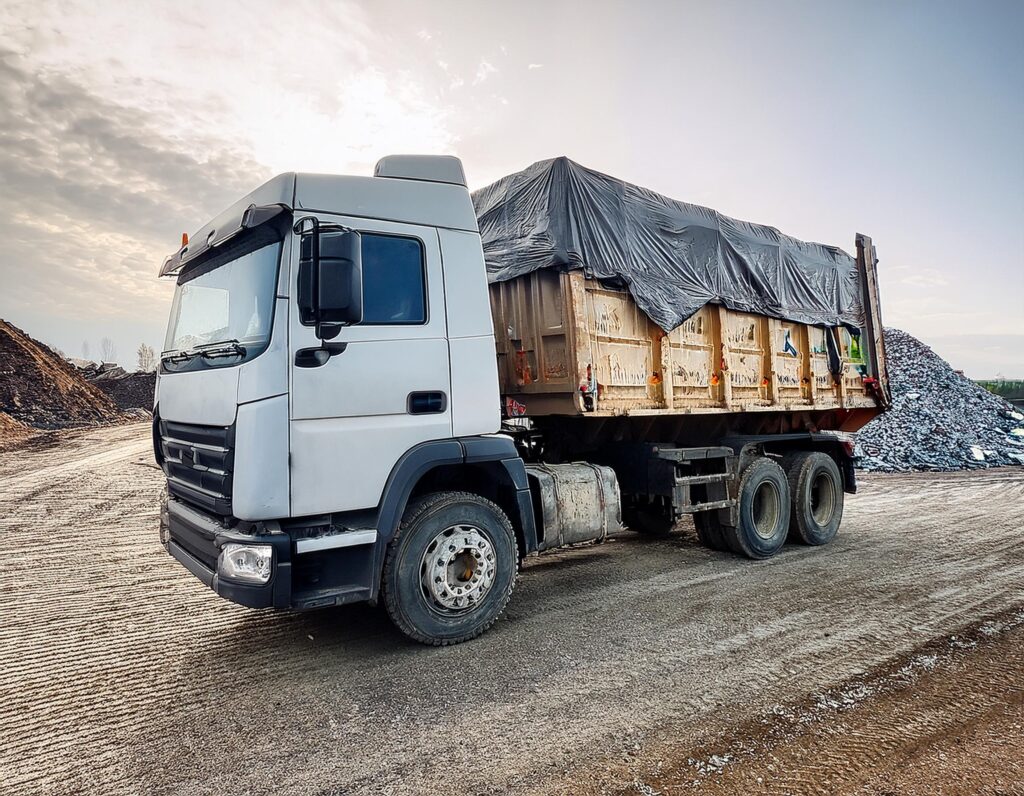 Dump Truck loaded with covered waste